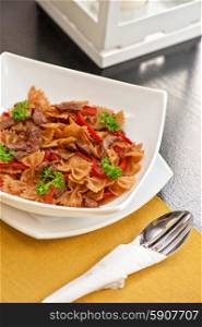 Farfalle. Farfalle with vegetable and beef