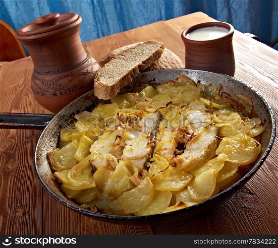 farm-style country Codfish with potatoes and onions baked