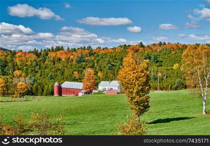 Farm with barn at sunny autumn day in Vermont, USA