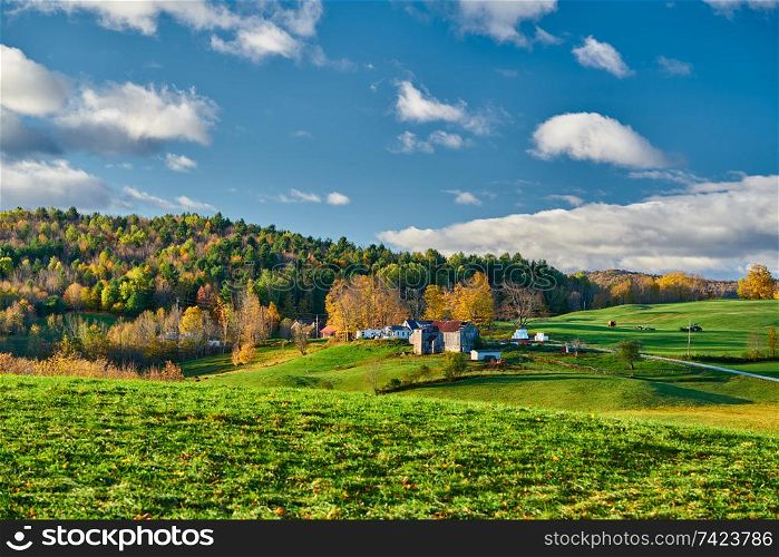 Farm with barn at sunny autumn morning in Vermont, USA
