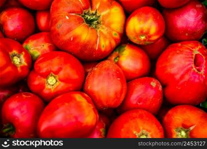 Farmers market natural ripe tomatoes. Fresh red tomato