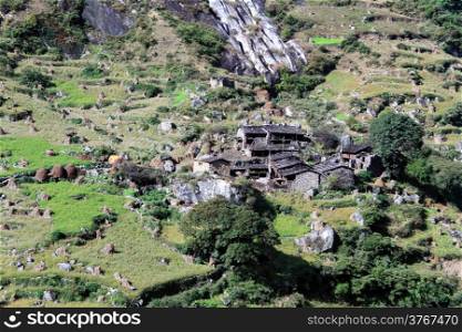 Farmhouses on the slope of mount in Nepal