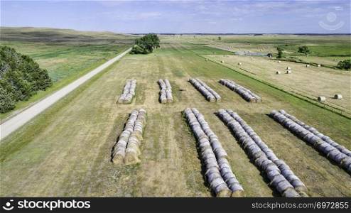 farmland with hay bales in Nebraska Sandhills -aerial view