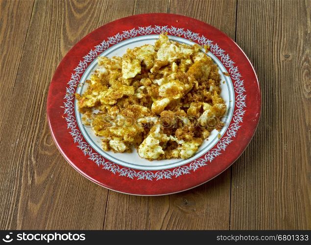 Farofa de ovos egg with flour or cassava.Latin Kitchen