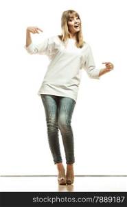Fashion and advertisement concept. Full length woman pointing her white blank top tshirt isolated