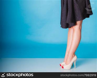 Fashion and beauty of female part body. Sexy girl legs in high heels. Studio shot.