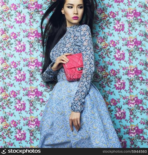 Fashion art photo of beautiful elegant lady on floral background. Spring-Summer