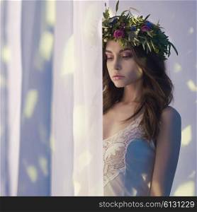 Fashion art photo of beautiful lady in flower diadem. Spring/Summer