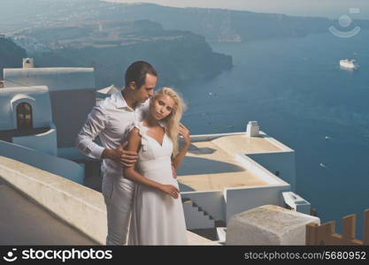 Fashion art photo of bride and groom on the seashore. Wedding