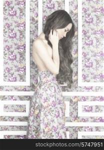 Fashion art photo of sensual elegant lady on floral background