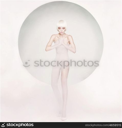 Fashion art studio photo of elegant sensual woman on geometric background