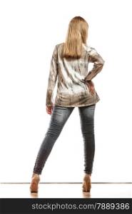 Fashion. Attractive blonde fashionable woman jeans pants bright sleeve shirt rear view isolated studio shot