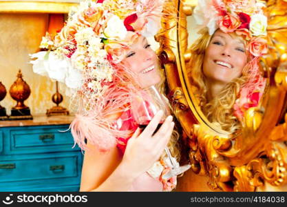 fashion baroque blond woman drinking red wine in grunge house