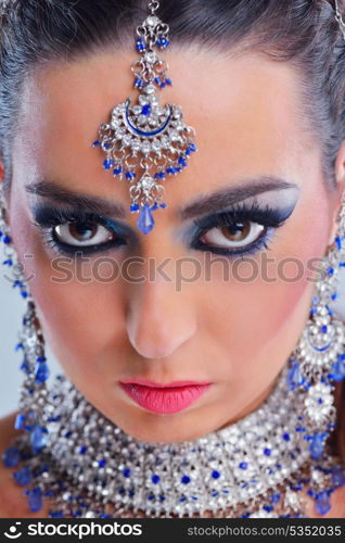 Fashion Beauty. Beautiful Woman With hairsyle and Luxury Makeup isolated on white background in studio. Beautiful Girl Face