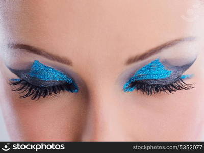 Fashion Beauty. Beautiful Woman With hairsyle and Luxury Makeup isolated on white background in studio. Beautiful Girl Face