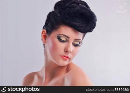 Fashion Beauty. Beautiful Woman With hairsyle and Luxury Makeup isolated on white background in studio. Beautiful Girl Face
