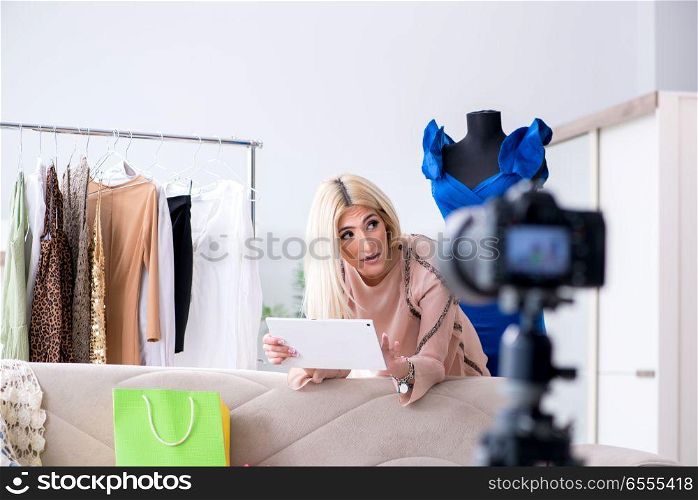 Fashion blogger recording new video for her vlog