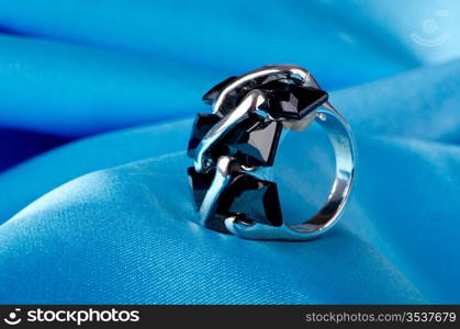 Fashion concept with ring on background