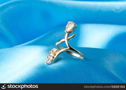 Fashion concept with ring on background