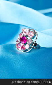 Fashion concept with ring on background