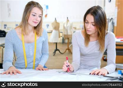 fashion designer drawing her ideas