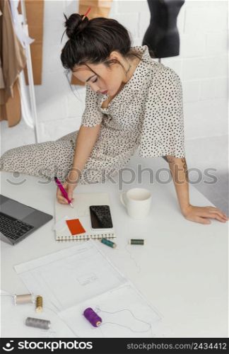 fashion designer working her workshop 4