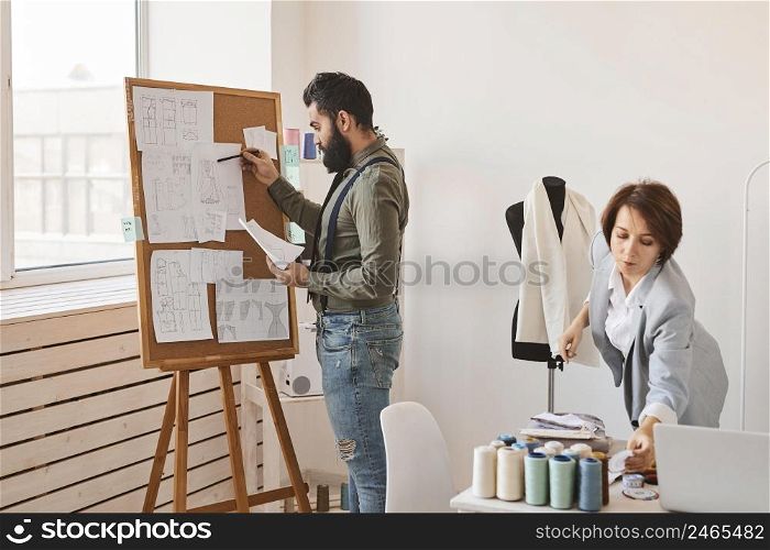 fashion designers atelier with dress form idea board