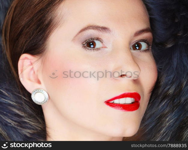 Fashion elegance and beauty. Woman in fur coat beautiful face makeup red lips, lady retro style portrait