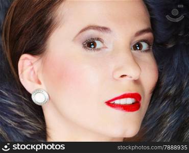 Fashion elegance and beauty. Woman in fur coat beautiful face makeup red lips, lady retro style portrait