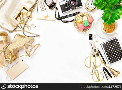 Fashion flat lay for bloggers social media. Feminine accessories, bag, shoes, office supplies, vintage no name photo camera and green plant on white background