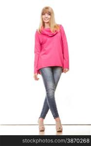 Fashion. Full body blonde fashionable woman jeans pants pink blouse. Female model posing isolated studio shot
