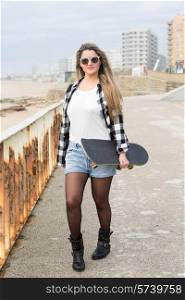 Fashion lifestyle, Beautiful young woman with skateboard