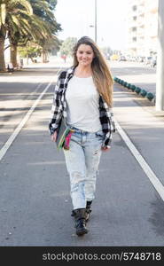 Fashion lifestyle, Beautiful young woman with skateboard