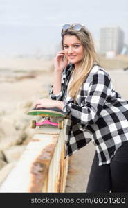 Fashion lifestyle, Beautiful young woman with skateboard