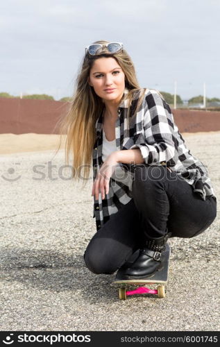 Fashion lifestyle, Beautiful young woman with skateboard