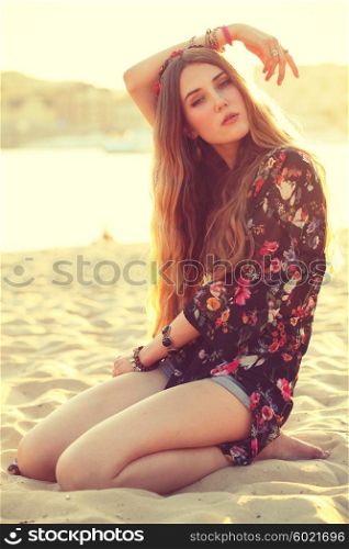 Fashion Lifestyle. Fashion Portrait of Beautiful Young Woman Outdoors. Soft warm vintage color tone. Artsy Bohemian Style.