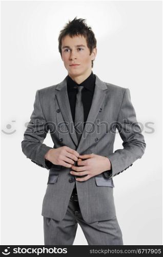 Fashion men pants, a shirt with the grey background