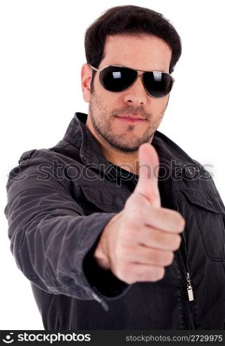 Fashion model showing thumbsup wearing sunglasses on a white background