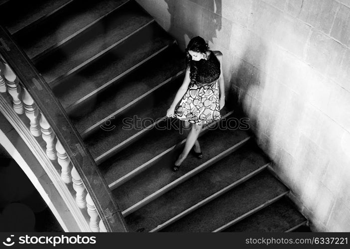 Fashion model with designer dress at the Charles V Palace in Alhambra, Granada, Spain