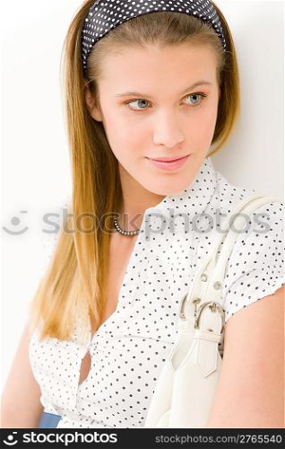 Fashion model - young woman posing in summer designer clothes