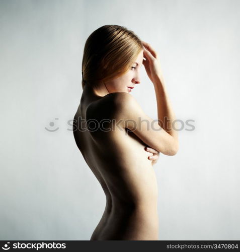 Fashion photo of a beautiful nude woman