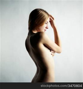 Fashion photo of a beautiful nude woman