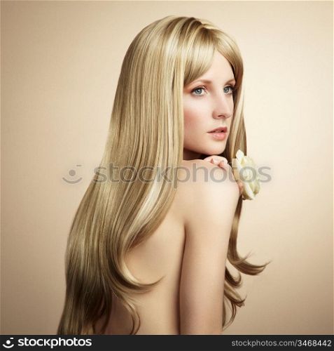 Fashion photo of a young woman with blond hair