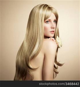 Fashion photo of a young woman with blond hair