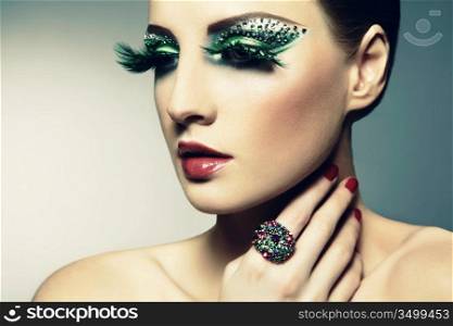 Fashion photo of a young woman with long eyelashes