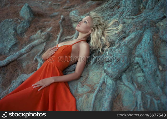 Fashion photo of beautiful lady and mighty tree