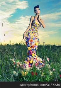 Fashion photo of beautiful lady in dress of flowers