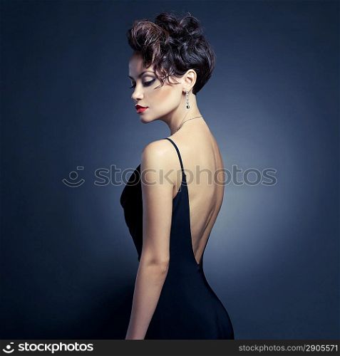 Fashion photo of beautiful lady in elegant evening dress