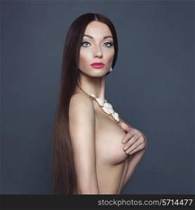 Fashion photo of beautiful naked lady with necklace