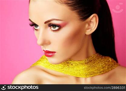 Fashion photo of beautiful woman on pink background. Beauty portrait